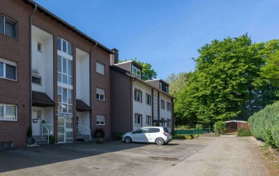 Helle 4 Zimmer-Wohnung in begehrter Wohnlage mit Loggia, Kaminofen, eigener Garage & Stellplatz