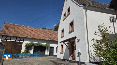 Gepflegtes Einfamilienhäuschen mit tollem Garten und großem Nebengebäude