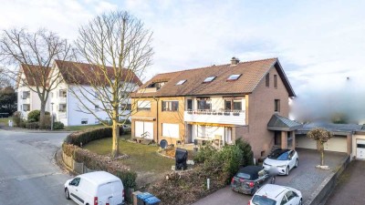 Großzügige 6-Zimmer-EG-Wohnung mit Kamin, Fußbodenheizung, 3 Terrassen und umlaufendem Garten