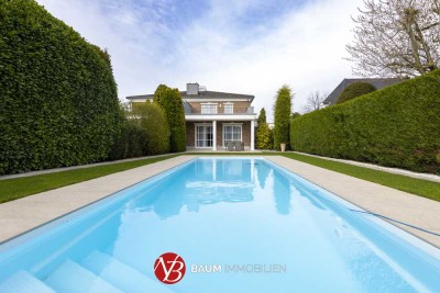 Mit Südgarten, Außenpool und 3 Garagenstellplätzen! Exklusive Villenhälfte in Alt-Meererbusch