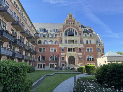 "Stil trifft Lage: Frei-werdende Maisonette-Wohnung im historischen Buchgewerbehaus"