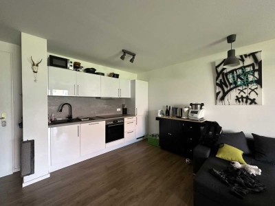 Moderne 2-Zi.-Wohnung mit Einbauküche, Balkon, Tiefgaragenplatz