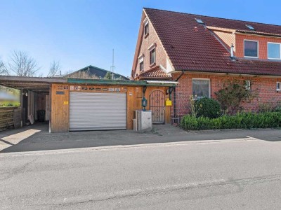 Familienfreundliches 4 bis 5 Zimmer-Reihenendhaus mit großer Garage in Hennstedt (Kreis Steinburg)