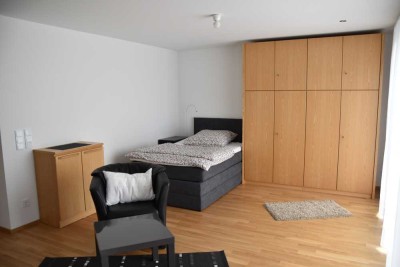 Wohnen in Toplage: Moderne möblierte 1-Zimmer-EG-Wohnung mit Terrasse