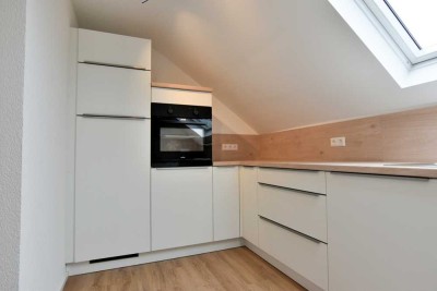 Neurenovierte 4-Zimmer-Wohnung mit Balkon, Garage und Gartenanteil!