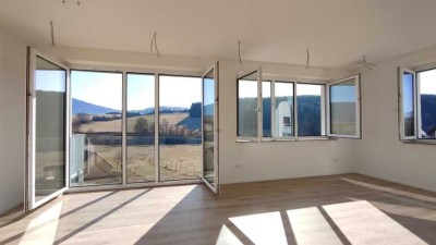 Moderne 2,5 Zimmer Wohnung mit wunderbarem Ausblick und sonnigem Balkon