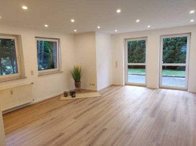 Exzellente Erdgeschoss Wohnung mit Terrasse und Garten
