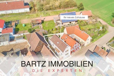 Ihr neues Zuhause: Einfamilienhaus mit Garten und Dachterrasse mit Sonnenuntergangsblick