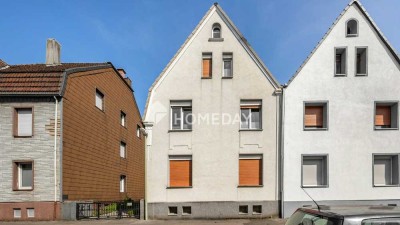 Charmante Doppelhaushälfte mit ELW, Garten & Vermietungspotenzial – idyllisch wohnen in ruhiger Lage
