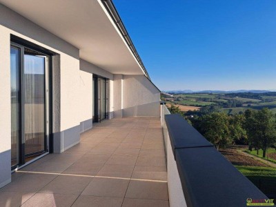 Ein Zuhause der besonderen Art – modern, exklusiv und außergewöhnlich! Dieser einmalige Wohntraum bietet ein komfortables Zuhause inkl. Gartenfeeling auf der großzügigen Dachterrasse mit Weitblick.