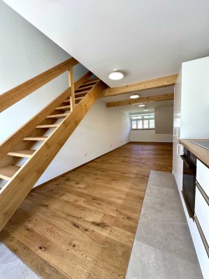 Erstbezug mit Einbauküche: Geschmackvolle 2-Raum-Maisonette-Wohnung mit geh. Innenausstattung