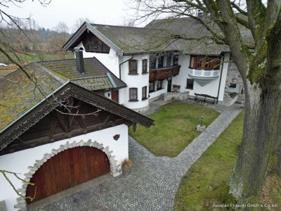 Außergewöhnliche Eigentumswohnung mit Garage und großem Garten