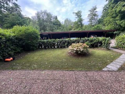 Zentral gelegene ebenerdige Erdgeschosswohnung mit Garten, Carport und  eigener Terrasse