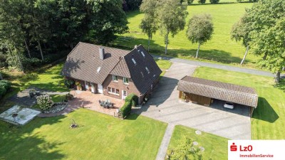 Wohnhaus mit zwei Einheiten in idyllischer Lage mit Gartenteich