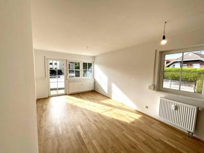 WIE NEU! Sonnige 2-Zi.-Gartenwohnung mit Terrasse, Eigengarten und Carport