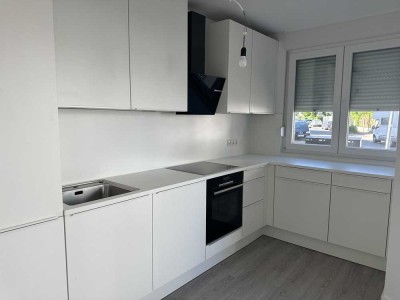 Stilvolle 2,5-Zimmer-Wohnung mit Loggia und moderner Einbauküche. Erstbezug!