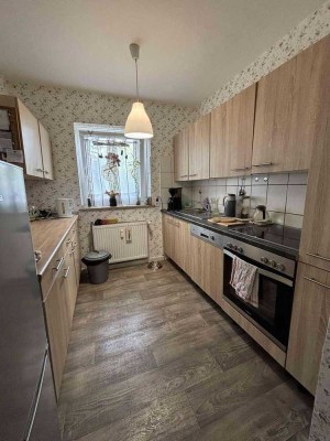 Zentrumsnahe Eigentumswohnung mit eigenem Garten und Balkon