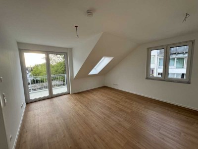 Helle Dachgeschosswohnung mit Balkon und inkl. Tiefgaragenstellplatz