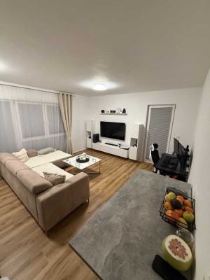 Helle vermietete 2-Zimmer-Neubauwohnung mit Balkon – Sichere Rendite in Toplage