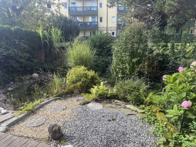 Herrliche 2-Zimmer-Wohnung mit Terrasse und weiterem Potential im Souterrain