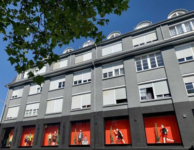 Modernes und im Zentrum gelegenes Appartment mit Einbauküche und Tiefgaragenstellplatz.