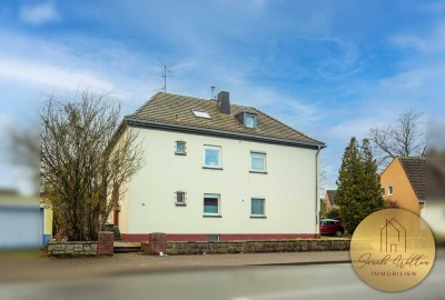 Freihstehendes Mehrfamilienhaus auf großem Grund in Stadtlage