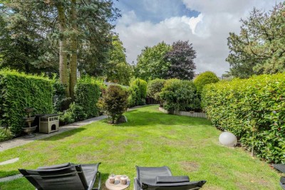 Wohnen mit Garten: Gepflegte Erdgeschosswohnung mit Privatoase in zentraler Lage