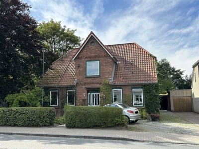 Historischer Charme trifft modernen Wohnkomfort – Zweifamilienhaus mit Ruhepol im Garten