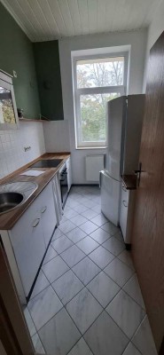 Helle 2-Zimmer-Wohnung mit Wintergarten, Terrasse und Einbauküche in ruhiger Lage