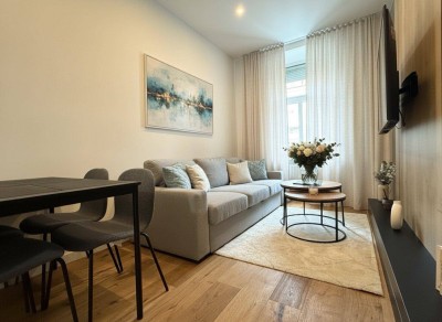 ZENTRUMSNAHE LAGE + 2 Zimmer + ca. 37m² WFL + Einbauküche + hochwertige Ausstattung + 1. Liftstock + Nähe Haptbahnhof