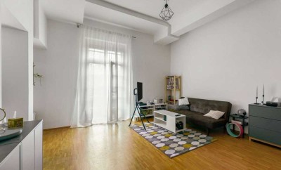 Stilvoll wohnen im kernsanierten Denkmal: 2 Zimmer mit Balkon & TG-Stellplatz