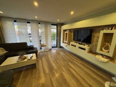 Modernisiertes Reihenhaus mit Garten, Sauna und Garage in ruhiger Rheda-Lage. Ein ideales Zuhause!