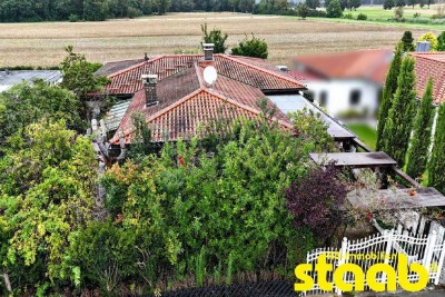 FREISTEHENDER 1-FAM.-BUNGALOW MIT GARAGE UND NEBENGRUNDSTÜCK IN BELIEBTER RANDLAGE