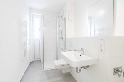 Großzügige 3-Zi.-Wohnung mit Sonnenbalkon und moderner Einbauküche in ERSTBEZUG