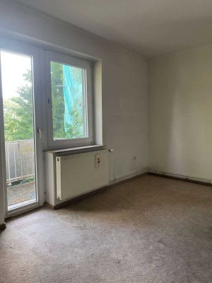 Schöne Wohnung mit Balkon, Garage und Potenzial