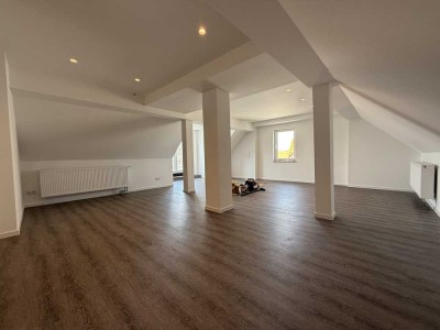 Erstbezug nach Sanierung mit EBK und Terasse: stilvolle 2-Zimmer-Wohnung in ruhiger Lage in Rodgau