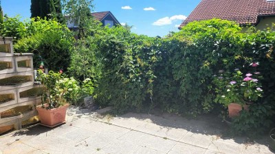 Lichtdurchflutete 3,5-Zimmer Erdgeschosswohnung mit großem Garten