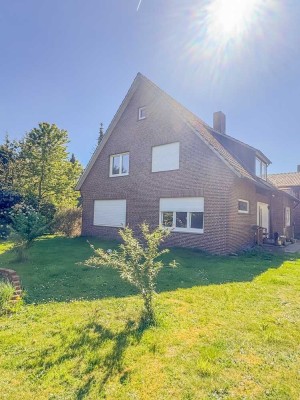 Exklusive Vierzimmerwohnung über zwei Ebenen mit Terrasse, Gartenoption und Garage