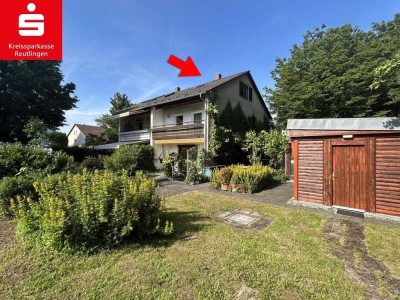 Renovierungsbedürftige Doppelhaushälfte mit großzügigem Garten und Einzelgarage