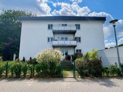 Vermietete Erdgeschosswohnung mit Garten, Terrasse, Garage und Bootsanlegernutzung