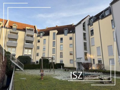 Moderne 3-Zimmer-Wohnung in familienfreundlicher Lage mit Balkon und Tiefgaragenstellplatz
