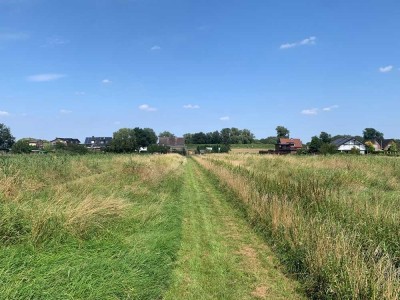 Besonders interessant: Sonniger Bauplatz und ältere Doppelhaushälfte mit herrlichem Weitblick