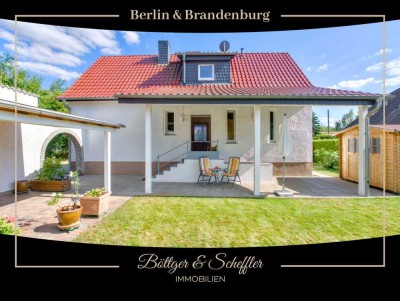 Gepflegtes Einfamilienhaus mit multifunktionalem Gäste-/ Hobbyhaus und Doppelgarage