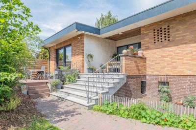 RESERVIERT - Moderner Wohntraum auf großzügigem Eckgrundstück – stilvoller Flachdachbungalow in Droc