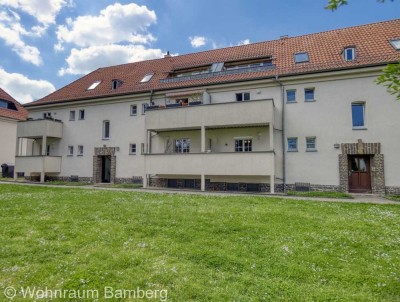 Zentral gelegene 3- Zimmer- Wohnung in ruhiger, gepflegter Wohnanlage mit Balkon und Blick ins Grüne