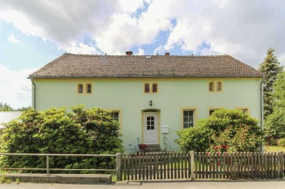 Wohnen mit Garten, Freistellplatz und einer Garage in naturnaher Lage