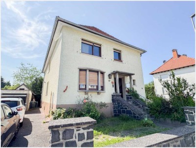 Großzügiges Ein-/Zweifamilienhaus mit tollem Garten in Hungen - Inheiden!