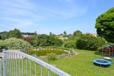 164 m² Wohnkomfort: 4 Zimmer mit Balkon, Garage & Garten