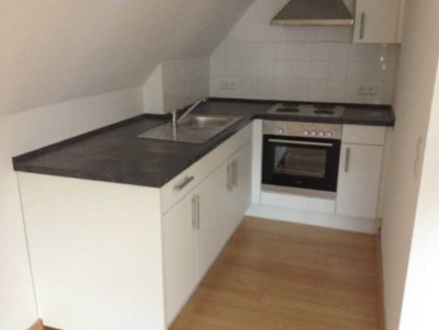 Charmante 1,5-Zimmer-Dachgeschosswohnung mit Loggia im Herzen von Wiedenbrück