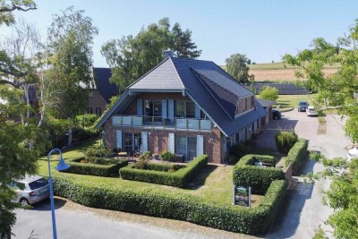 Traumhaftes Mehrfamilienhaus am Bodden – Modernes, Ökologisches Wohnen mit Luxusanspruch